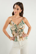 Woman wears a cami top