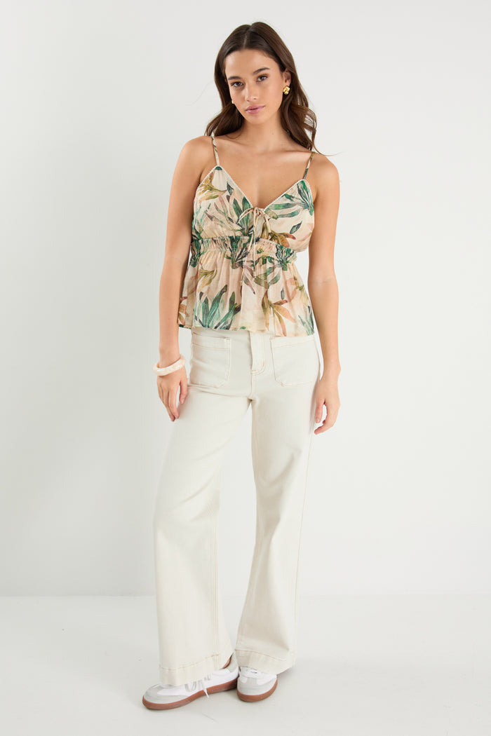 Woman wears a cami top