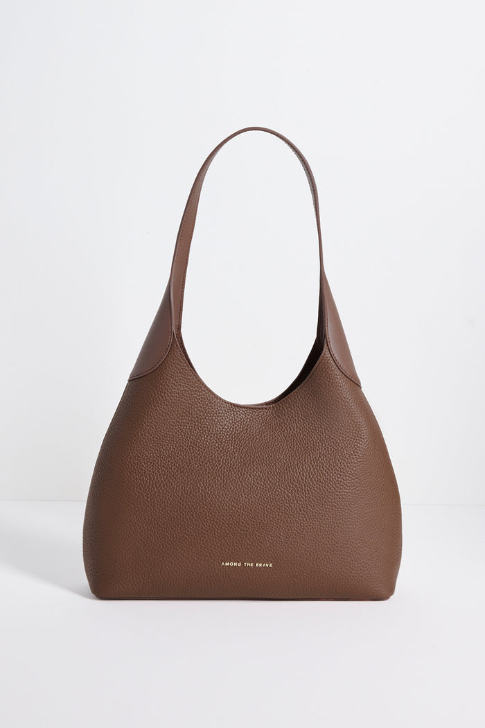 Brown handbag on a white background