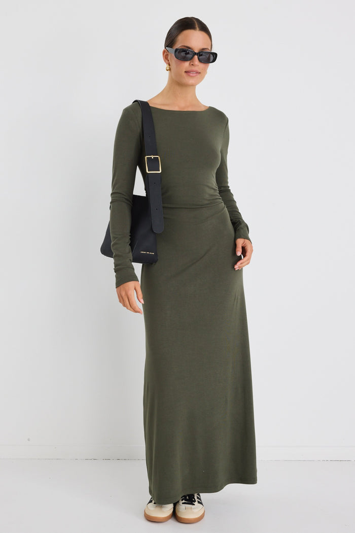 Model wears a khaki long sleeve maxi dress