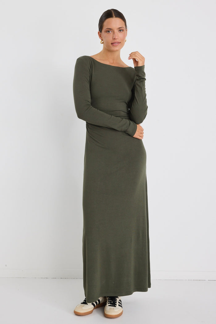 Model wears a khaki long sleeve maxi dress