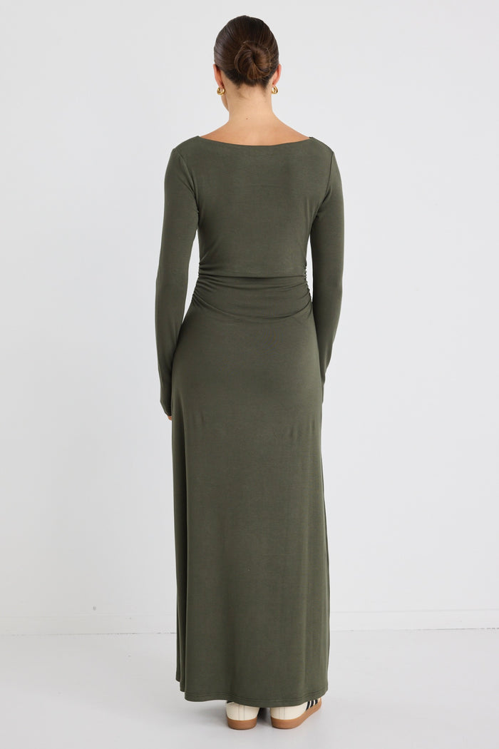 Model wears a khaki long sleeve maxi dress