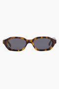 model wears a brown tort sunglass
