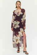 Woman wearing a floral dress on a white background