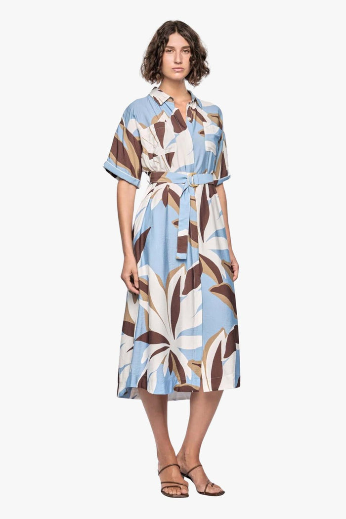 model wears a blue white brown pattern midi shirt dress