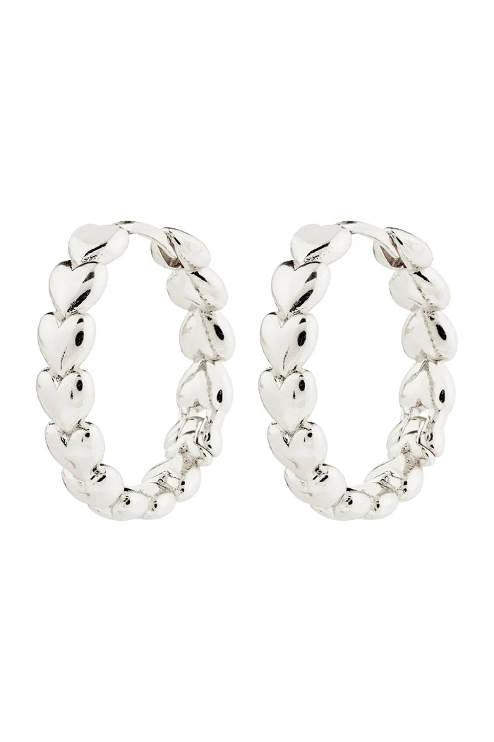 Pair of silver hoop earrings on a white background