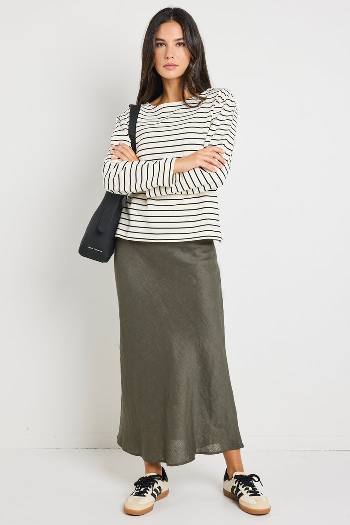 model wears stripe long sleeve black and white boat neck tee