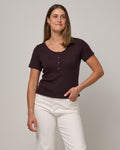 Model wearing Marie Pointelle Henley in Espresso, a dark brown color. Marie Pointelle Henley is a short sleeve, scoop neck, fitted top available in sizes XS-3X.