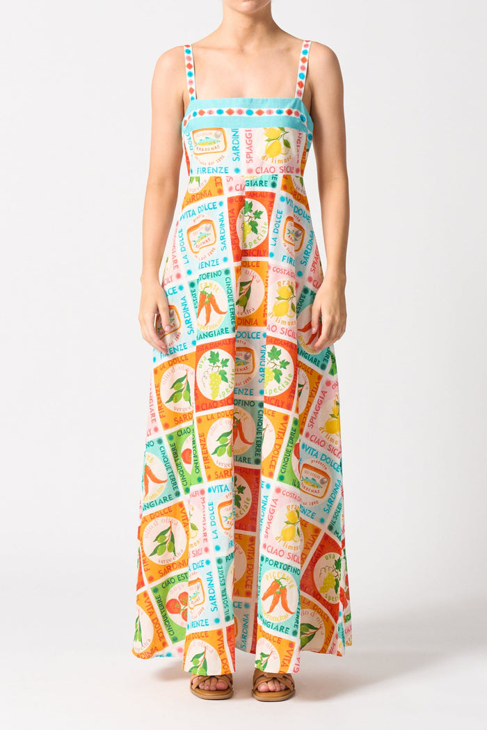 model wears a colourful thin strap maxi dress