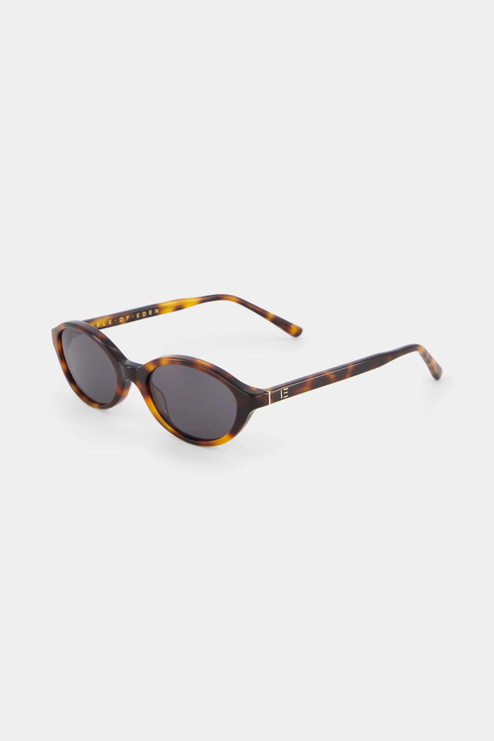 Brown sunglasses with a brand logo on a white background