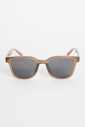 Translucent brown classic square sunglasses with dark tinted lenses, photographed on a white background.