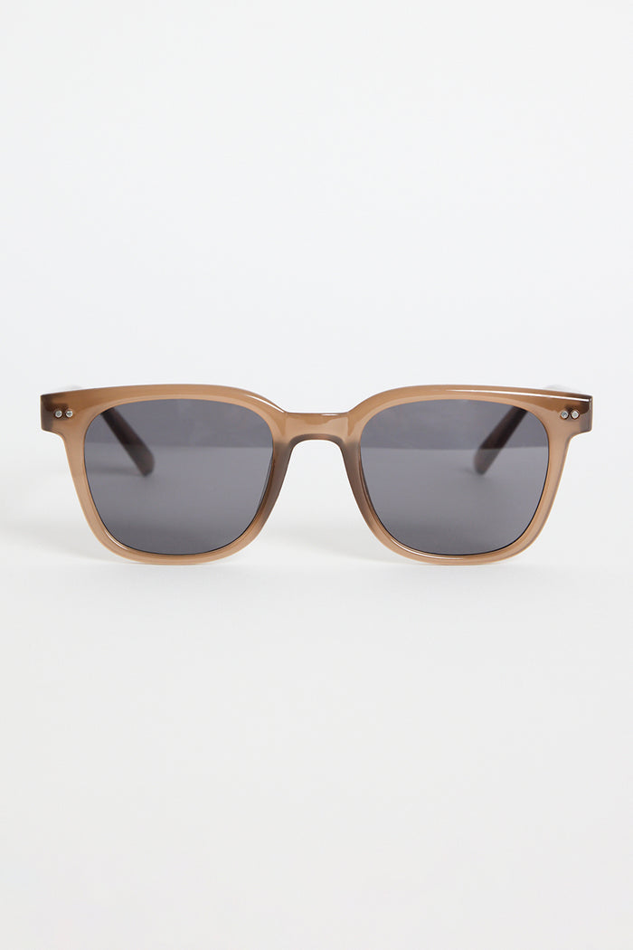 Translucent brown classic square sunglasses with dark tinted lenses, photographed on a white background.