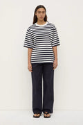 Model wearing striped t-shirt