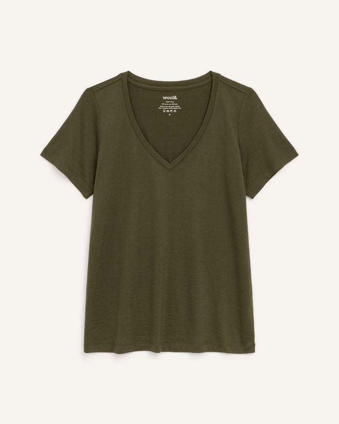 Laydown of Morgan V-Neck Tee in Forest Night, a muted dark green color. Morgan V-Neck Tee is a merino wool short sleeve, v-neck, regular fit tee available in sizes XS-3X.