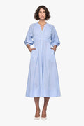 woman wearing a blue and white striped midi shirt dress