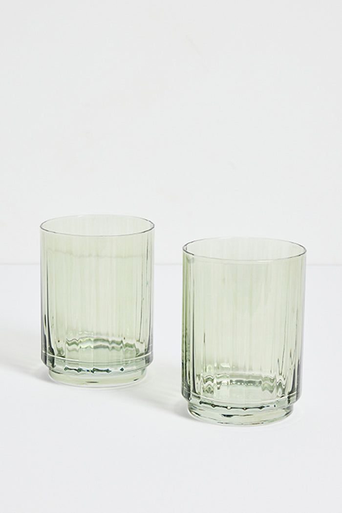 two green ribbed tumblers