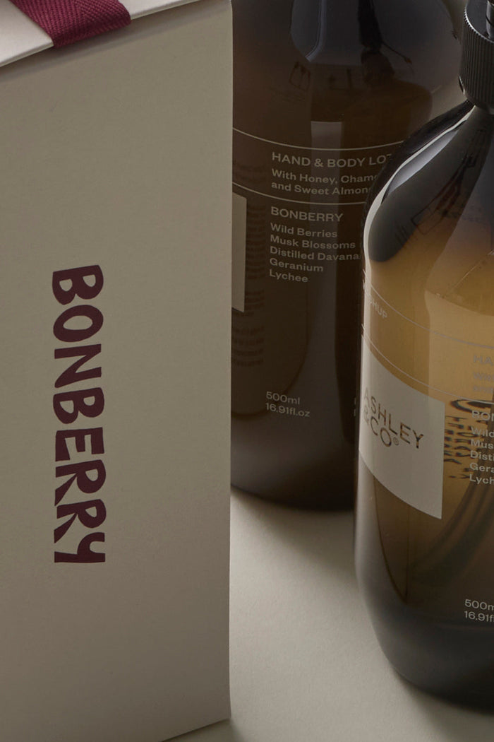 Bonberry branded bottles and packaging on a neutral background