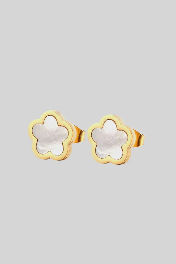 A pair of gold-toned stud earrings shaped like small flowers, featuring a pearlescent centre framed by a polished gold outline for a soft, elegant finish