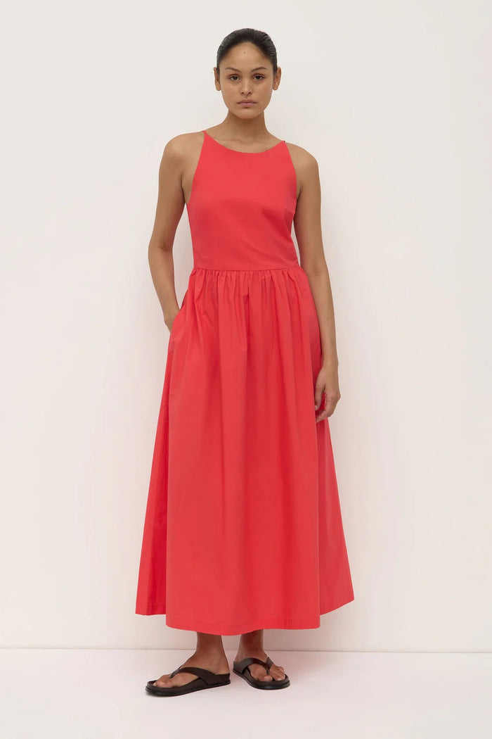 Woman wearing a red midi dress