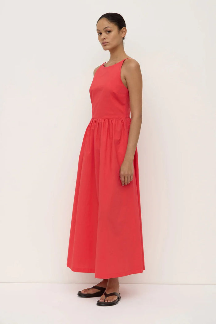 Woman wearing a red midi dress