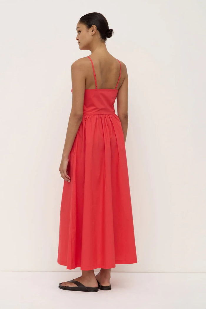 Woman wearing a red midi dress