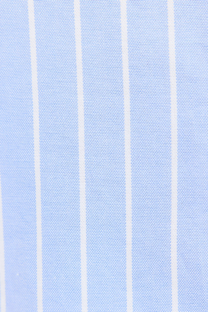 Close-up of light blue fabric with white vertical stripes