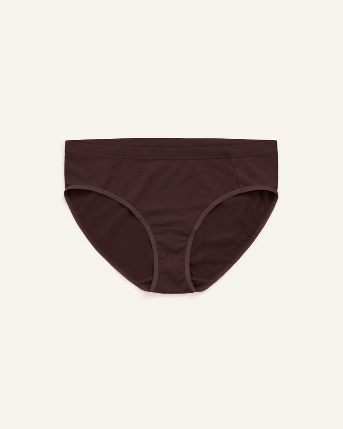 Laydown of Roam Bikini in Espresso, a dark brown color. Roam Bikini is a merino wool underwear available in sizes XS-3X.