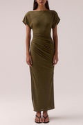 model wears a olive green ruched dress