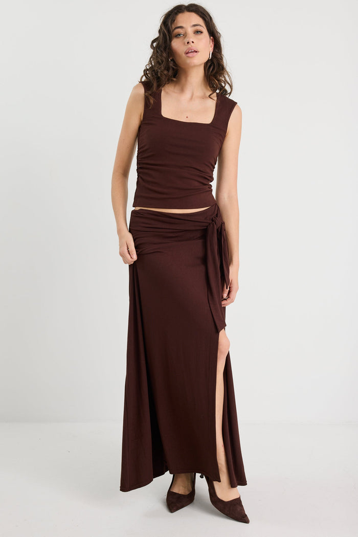 woman wearing a brown ruched set