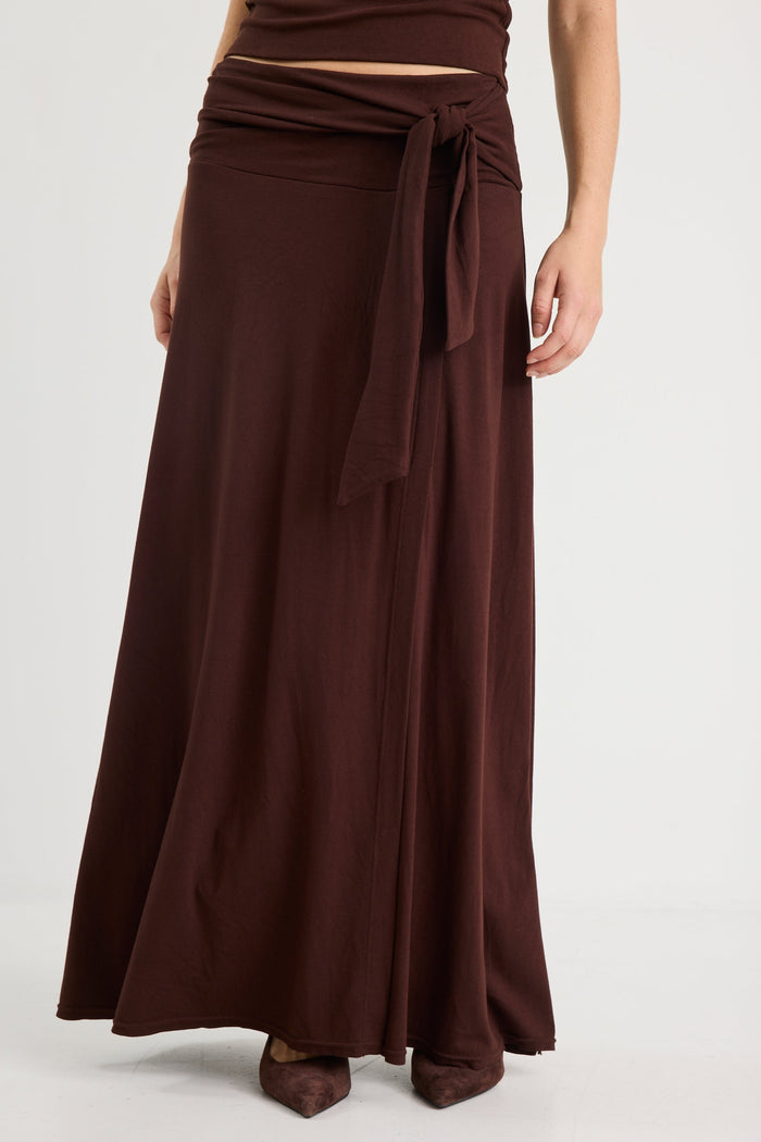 Woman wearing a brown ruched set