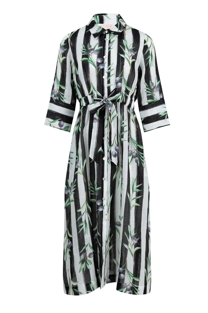 Woman wearing a black white stripe with olive branches