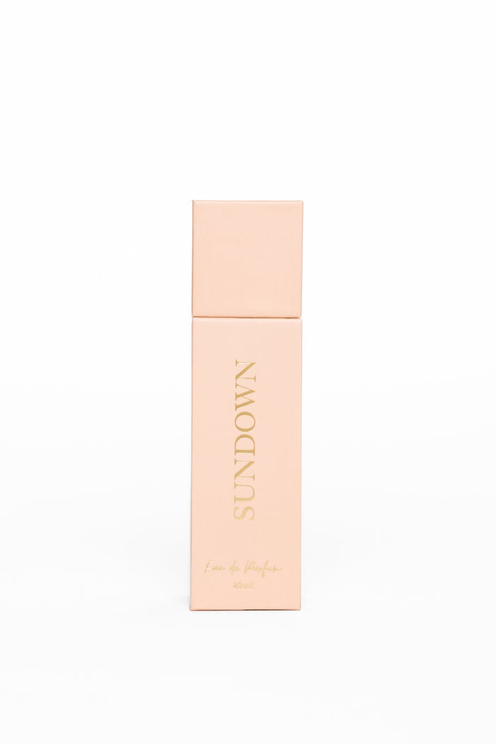 Cosmetic product with 'Sundown' branding on a white background