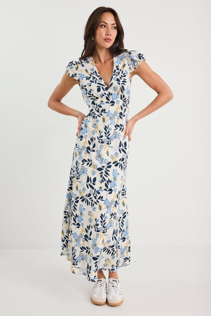 Woman wearing a floral dress on a white background
