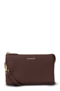 Brown leather clutch bag with gold zipper and strap on a white background