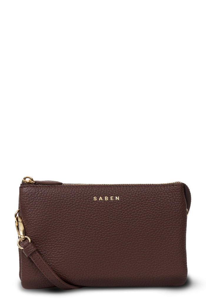 Brown leather clutch bag with gold zipper and strap on a white background