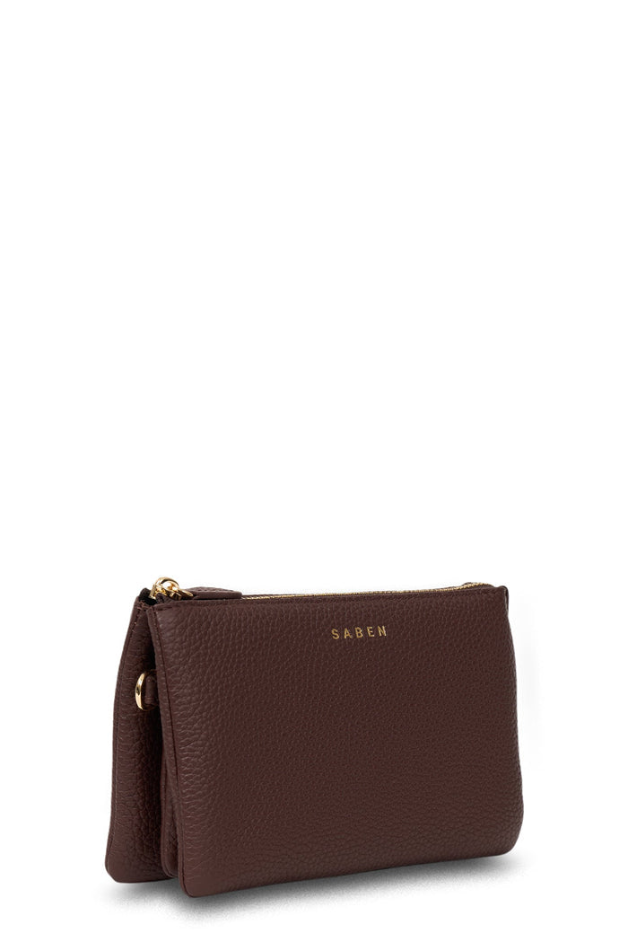 Brown leather pouch with gold zipper and 'SAGEN' branding on a white background