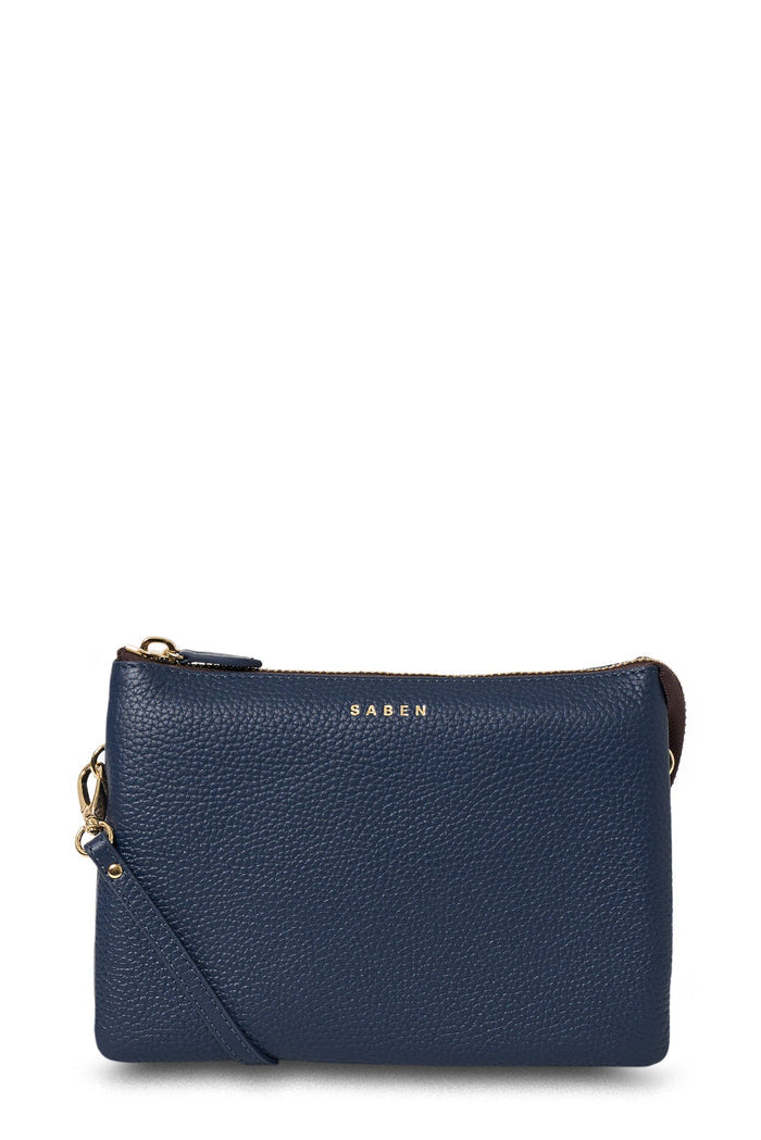 Blue leather clutch bag with a strap on a white background