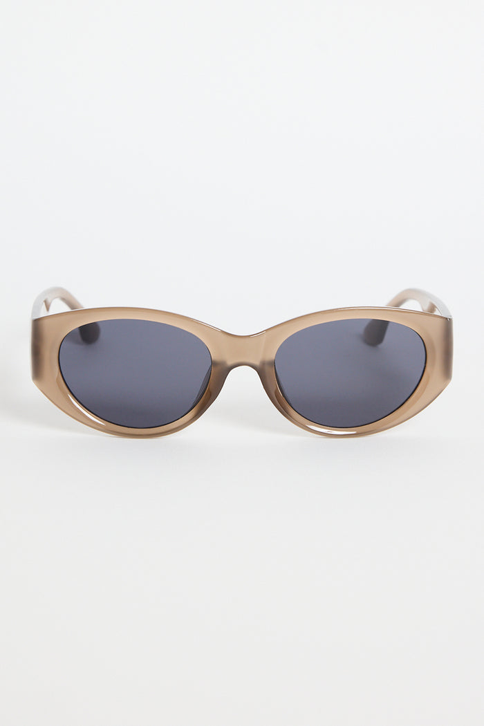Espresso-brown cat-eye sunglasses with dark tinted lenses, photographed on a white background