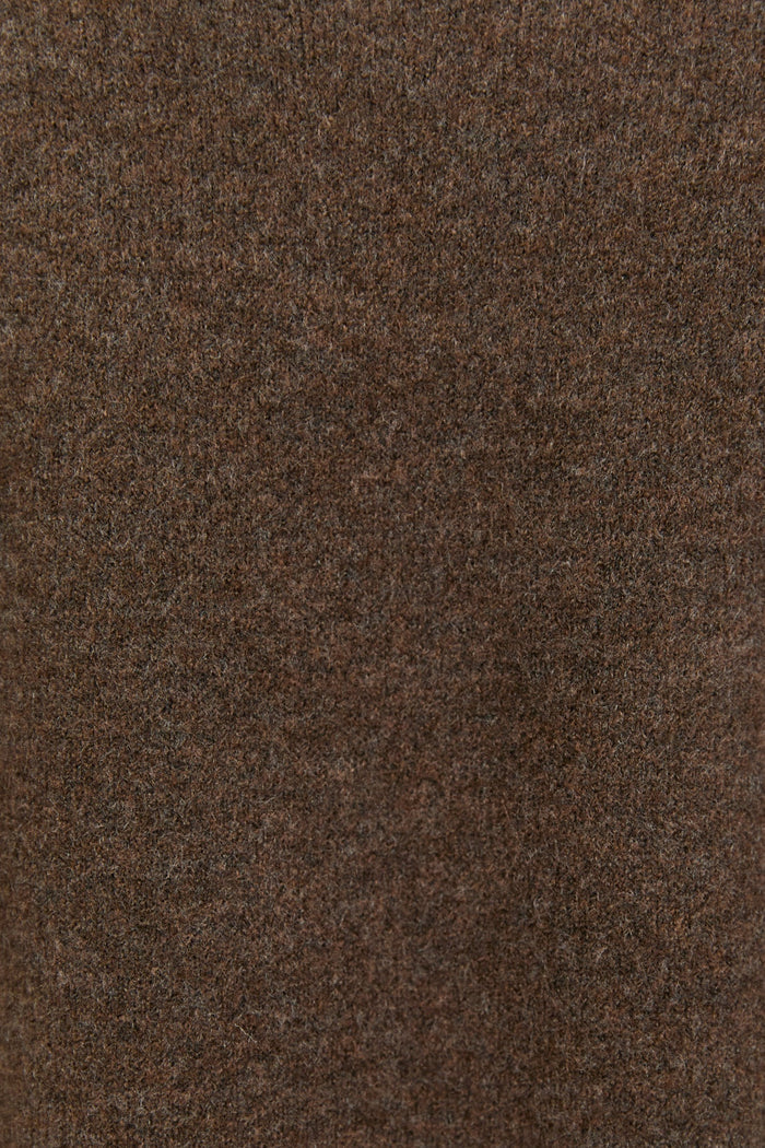 Close-up of a brown sweater with visible texture