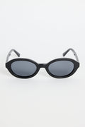 Black oval sunglasses with dark tinted lenses and a glossy frame, photographed against a white background