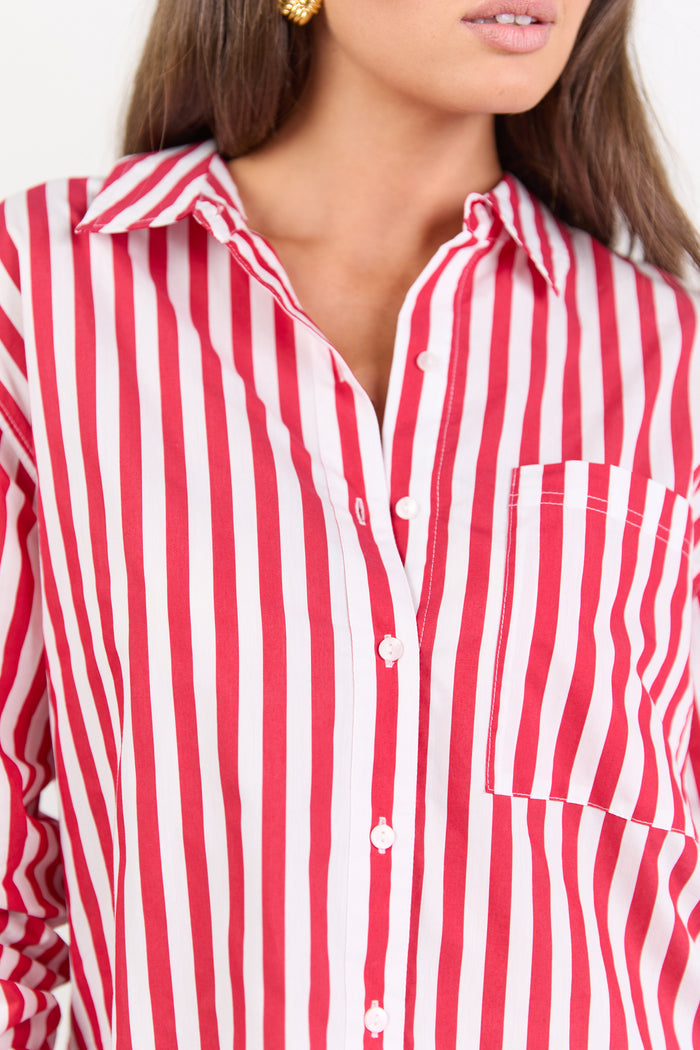 Red and white striped shirt worn by a person